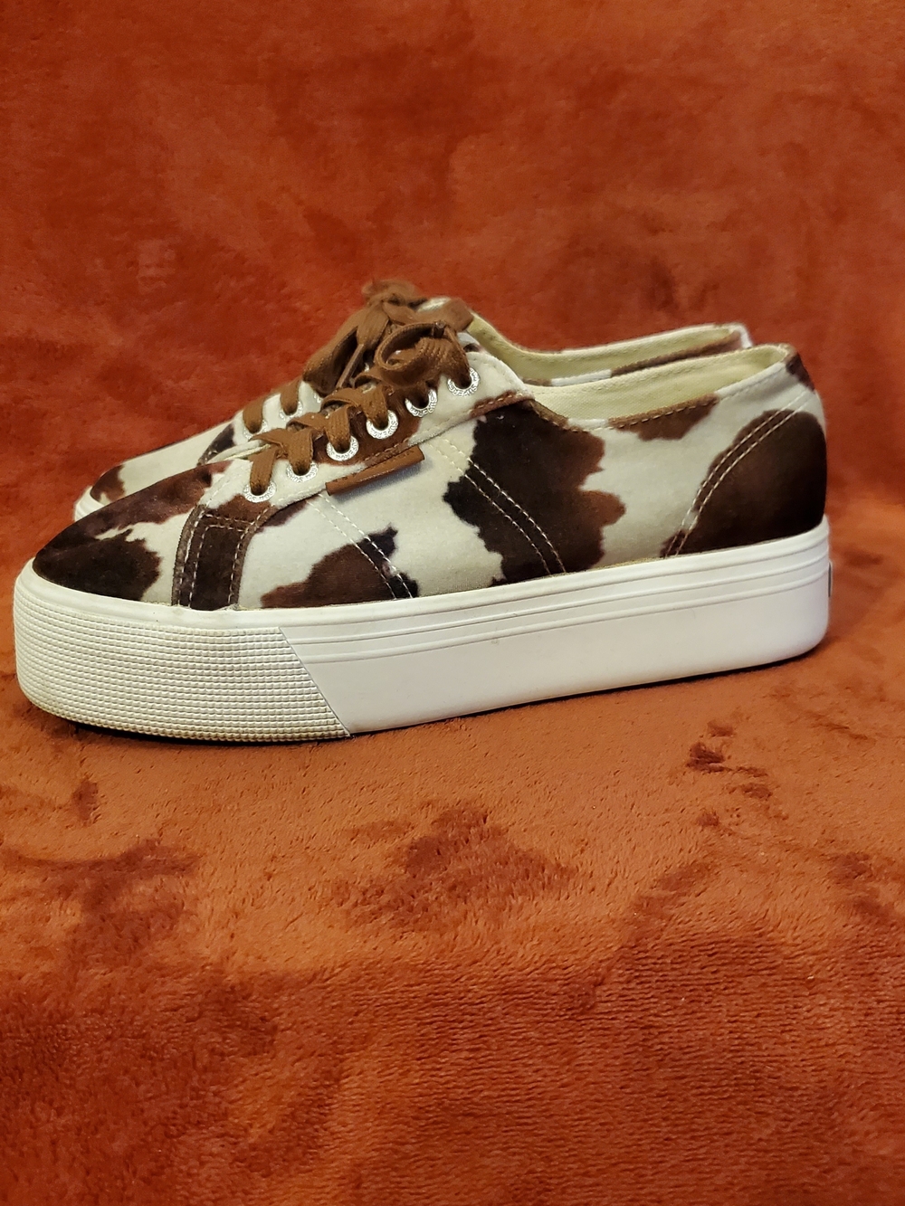 Women’s Cow Print Platform Sneakers in Brown and White